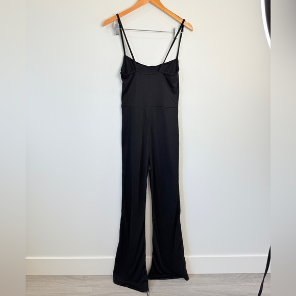 PrettyLittleThing Black Ribbed Strappy Square Neck Flared Jumpsuit - Picture 7 of 9